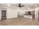 Open-concept kitchen boasts a breakfast bar, stainless steel appliances, and sleek finishes at 11674 E Yeager Cyn, Gold Canyon, AZ 85118