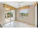 Bedroom with sliding doors and a view of the pool and patio area at 15109 W Camino Estrella Dr, Surprise, AZ 85374