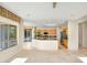 Bright kitchen featuring a central island with black countertops and stainless steel appliances at 15109 W Camino Estrella Dr, Surprise, AZ 85374