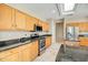 Modern kitchen with stainless steel appliances, granite countertops, and plenty of cabinet space at 15109 W Camino Estrella Dr, Surprise, AZ 85374