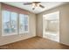 Room with shuttered windows providing ample natural light and views of the outdoors at 15109 W Camino Estrella Dr, Surprise, AZ 85374