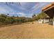 The sprawling backyard includes desert landscaping and the outdoor barbeque area at 16414 N Dixie Mine Trl, Fountain Hills, AZ 85268