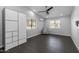 Spacious bonus room with high ceilings, modern lighting, and multiple windows at 16414 N Dixie Mine Trl, Fountain Hills, AZ 85268