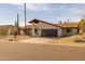 Attractive home with desert landscaping, a red tile roof, and a brown garage door at 16414 N Dixie Mine Trl, Fountain Hills, AZ 85268
