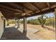 Spacious covered patio with ceiling fans, brick flooring, desert landscaping and mountain views at 16414 N Dixie Mine Trl, Fountain Hills, AZ 85268