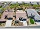 An aerial view of the home showcasing the pool and surrounding landscaping at 16949 W La Reata Ave, Goodyear, AZ 85395