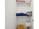 Walk-in closet with white shelves and clothes stored neatly at 16949 W La Reata Ave, Goodyear, AZ 85395