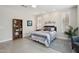 Well lit main bedroom features tile floor, plantation shutters, ceiling fan and reading nook at 16949 W La Reata Ave, Goodyear, AZ 85395