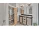 Modern bathroom features double sinks, stylish vanity, and a luxurious sauna at 20709 N 59Th Dr, Glendale, AZ 85308
