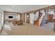 Open dining room with stone arches, tile flooring, and adjacent staircase at 20709 N 59Th Dr, Glendale, AZ 85308