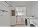 Convenient laundry room with storage and modern appliances at 20709 N 59Th Dr, Glendale, AZ 85308