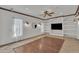 Bright living room with built-in shelving and recessed lighting at 20709 N 59Th Dr, Glendale, AZ 85308