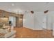 Inviting living room with stone archway and lots of natural light at 20709 N 59Th Dr, Glendale, AZ 85308