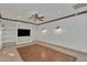Bright living room with built-in shelving and recessed lighting at 20709 N 59Th Dr, Glendale, AZ 85308