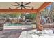 Covered patio overlooking a pool with a waterfall feature at 20709 N 59Th Dr, Glendale, AZ 85308