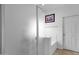 Clean bathroom featuring a glass shower, a soaking tub and white walls at 2514 E Espada Trl, Casa Grande, AZ 85194