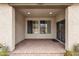 Covered outdoor patio perfect for enjoying the outdoors with three windows for natural light at 2514 E Espada Trl, Casa Grande, AZ 85194