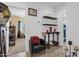 Cozy sitting area with neutral walls, tile flooring, accent furniture, and natural light at 2514 E Espada Trl, Casa Grande, AZ 85194