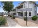 Charming condo featuring a private screened balcony, secure front entry and landscaped community grounds at 2910 W Marconi Ave # 105, Phoenix, AZ 85053
