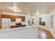 Efficient kitchen layout with modern appliances and a convenient breakfast bar at 2910 W Marconi Ave # 105, Phoenix, AZ 85053