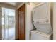 Convenient in-unit laundry closet with stackable washer and dryer, plus additional storage at 2910 W Marconi Ave # 105, Phoenix, AZ 85053