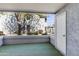 Outdoor patio with textured walls and a door leading to the exterior of the property at 2910 W Marconi Ave # 105, Phoenix, AZ 85053