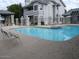 Sparkling community pool with ample seating and lounging area at 2910 W Marconi Ave # 105, Phoenix, AZ 85053