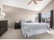 Bedroom featuring a ceiling fan, and neutral walls creating a cozy and inviting space at 3236 E Tanglewood Dr, Phoenix, AZ 85048