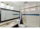 Bathroom featuring updated vanity, tile shower, and modern fixtures at 3802 N 73Rd Ave, Phoenix, AZ 85033