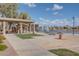 Park pavilion and picnic area with water fountain along the community lake at 40520 W Haley Dr, Maricopa, AZ 85138