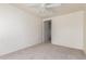 Neutral bedroom with light carpet and a ceiling fan that will complement any decor at 44792 W Paitilla Ln, Maricopa, AZ 85139