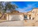 Charming single-story home with a two-car garage and well-maintained front yard at 44792 W Paitilla Ln, Maricopa, AZ 85139
