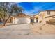 Single-story home with two-car garage, neutral colors, and low-maintenance desert landscaping at 44792 W Paitilla Ln, Maricopa, AZ 85139