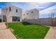Expansive backyard showcasing a modern house design and lush green grass for outdoor enjoyment at 4514 N 8Th Pl, Phoenix, AZ 85014