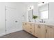 Bathroom with double sink vanity, modern fixtures, and a sleek design at 4514 N 8Th Pl, Phoenix, AZ 85014
