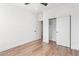 Bright, empty bedroom with wood floors, ceiling fan and neutral color scheme at 4514 N 8Th Pl, Phoenix, AZ 85014