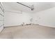 Spacious garage with a clean, epoxy floor and plenty of room for storage and vehicles at 4514 N 8Th Pl, Phoenix, AZ 85014