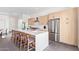 Beautiful kitchen featuring modern cabinets, stainless steel appliances, and a large island with barstool seating at 4514 N 8Th Pl, Phoenix, AZ 85014