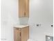 Bright laundry room featuring modern cabinets and a clean, functional design at 4514 N 8Th Pl, Phoenix, AZ 85014
