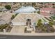 Aerial view of home with neutral colors and beautiful surroundings at 5323 W Rose Garden Ln, Glendale, AZ 85308