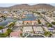 Aerial view of lakefront homes and a community showcasing waterfront living in Arizona at 5323 W Rose Garden Ln, Glendale, AZ 85308