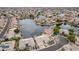 Picturesque aerial view of lakeside homes, showcasing community and waterfront access at 5323 W Rose Garden Ln, Glendale, AZ 85308