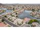 Beautiful aerial view of a waterfront community featuring homes with lake access at 5323 W Rose Garden Ln, Glendale, AZ 85308