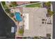 Stunning aerial view of a home with a private pool and well-manicured landscaping at 5323 W Rose Garden Ln, Glendale, AZ 85308