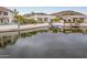 A waterfront home with a covered boat and beautiful scenery at 5323 W Rose Garden Ln, Glendale, AZ 85308