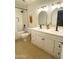 Modern bathroom with a double sink vanity, bathtub, and stylish fixtures, creating a spa-like experience at 8740 E Mulberry St, Scottsdale, AZ 85251