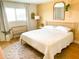 Bright bedroom with a comfy bed, natural light, and a cozy rug, perfect for relaxation at 8740 E Mulberry St, Scottsdale, AZ 85251