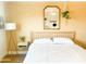 Bright and airy bedroom with a mirror, comfortable bed, and tasteful decor at 8740 E Mulberry St, Scottsdale, AZ 85251