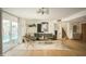 Cozy living area with green couch, stylish decor, and sliding glass doors to a private pool area at 8740 E Mulberry St, Scottsdale, AZ 85251