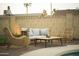 Cozy outdoor seating area, perfect for relaxation and entertainment next to the pool at 8740 E Mulberry St, Scottsdale, AZ 85251